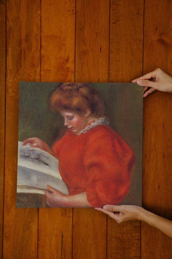 Young Woman Looking at a Print by Pierre-Auguste Renoir Impressionism Art dated 1896