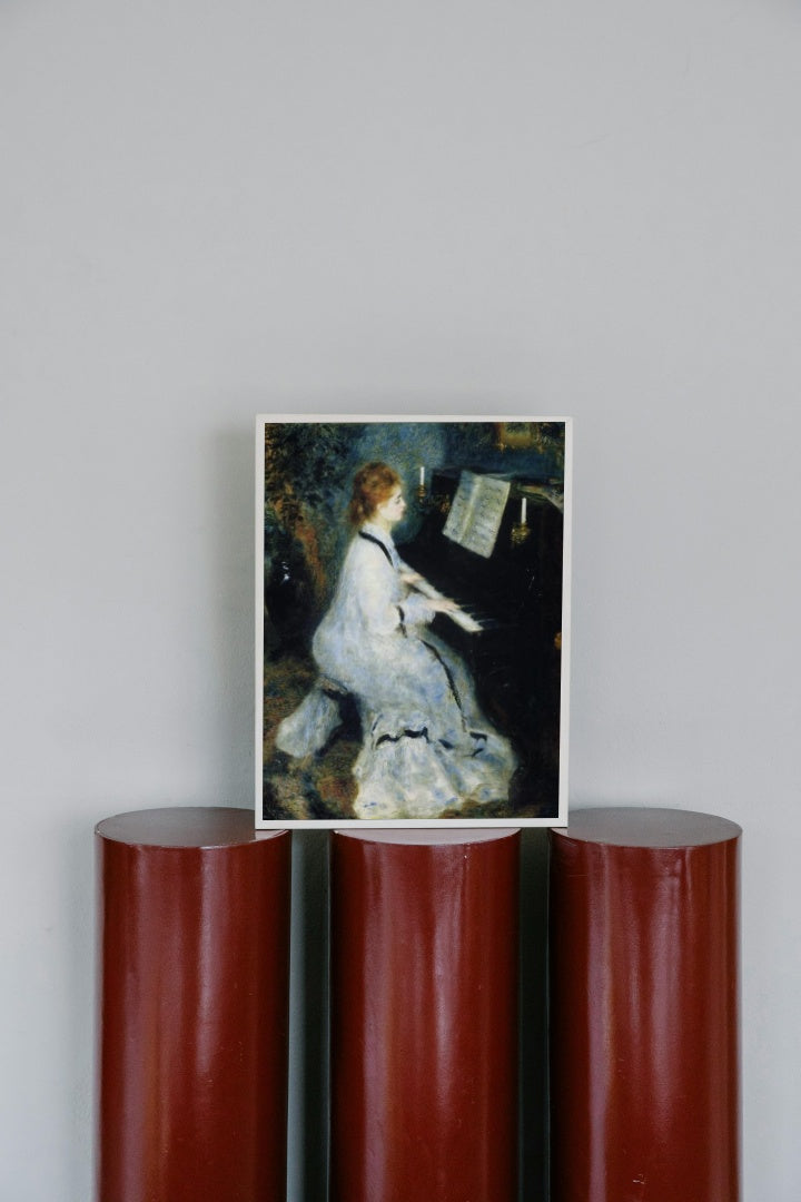 Young Woman at the Piano by Pierre-Auguste Renoir Impressionism Art dated 1876